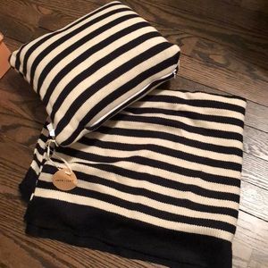striped throw pillow and blanket